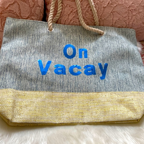 On vacay large tote with rope like design handles. - Picture 1 of 3